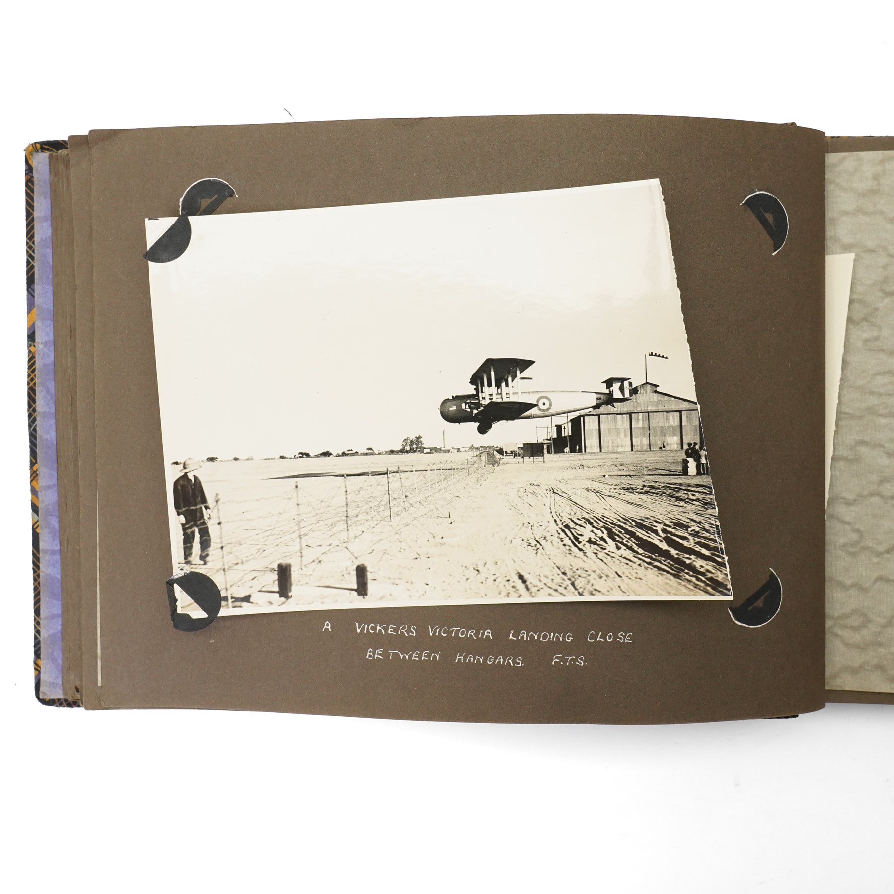 Photograph album and contents of 1920s photographs in Africa including Alan Cobham's African Air Route aircraft, Imperial Airways flight near Gaza, Bombing Squadron, Khartoum, various other aircraft in the Sudan, local views etc