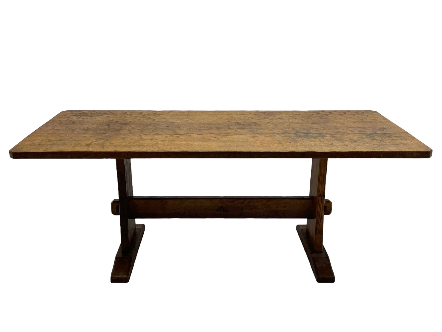 Yorkshire Oak 'Kingpost' - oak dining table, rectangular adzed top on tapered end supports, united by pegged stretchers carved with kingpost signature, on sledge feet, by Robert Ingham, Burton Leonard, Harrogate 