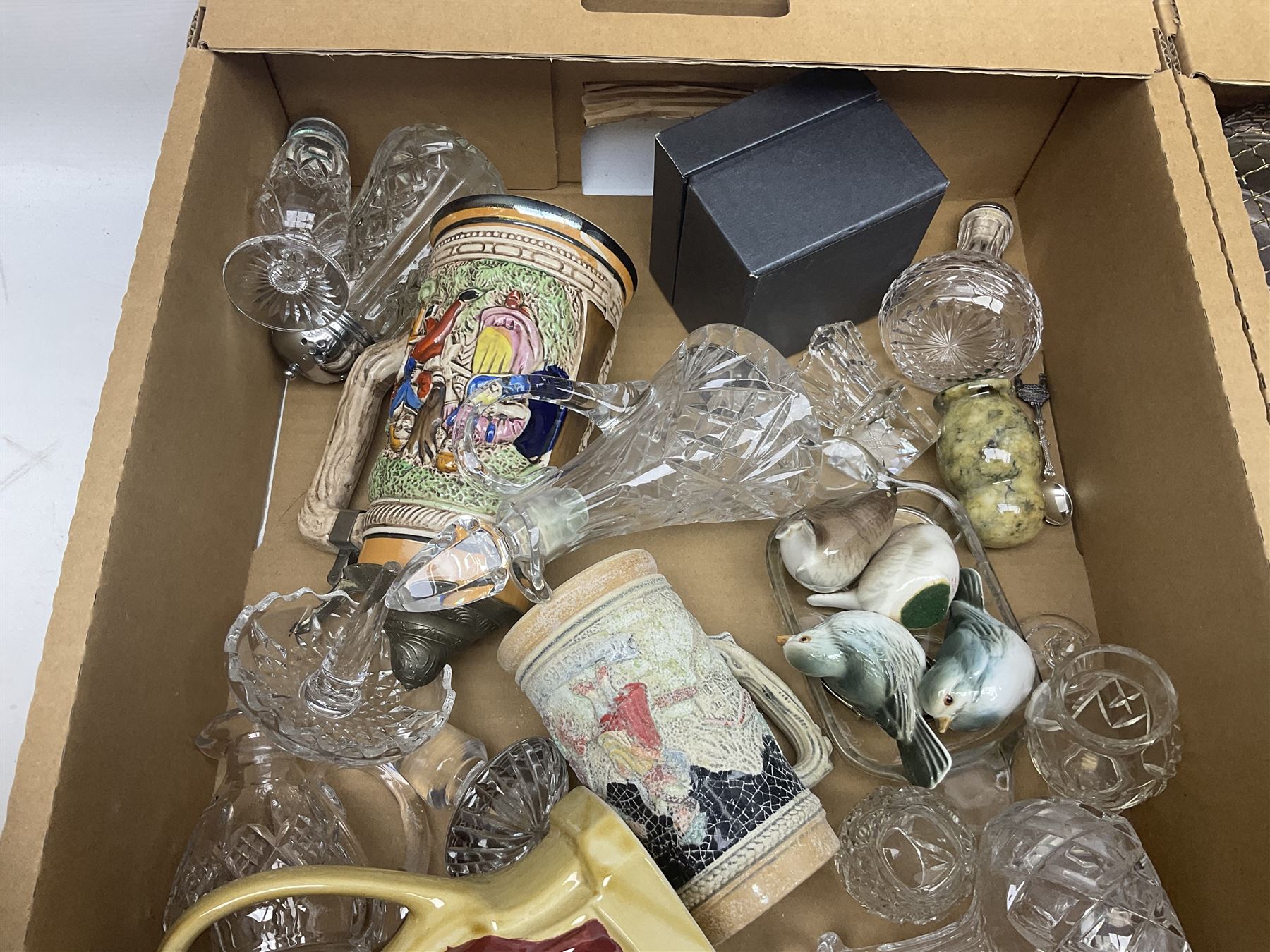 Caithness glass paperweight, together with other glassware, Zampiva figures and other collectables, in three boxes 