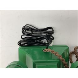 Jade green Bakelite telephone, of pyramid form with alphabet dial, brown braided handset cord and a base draw