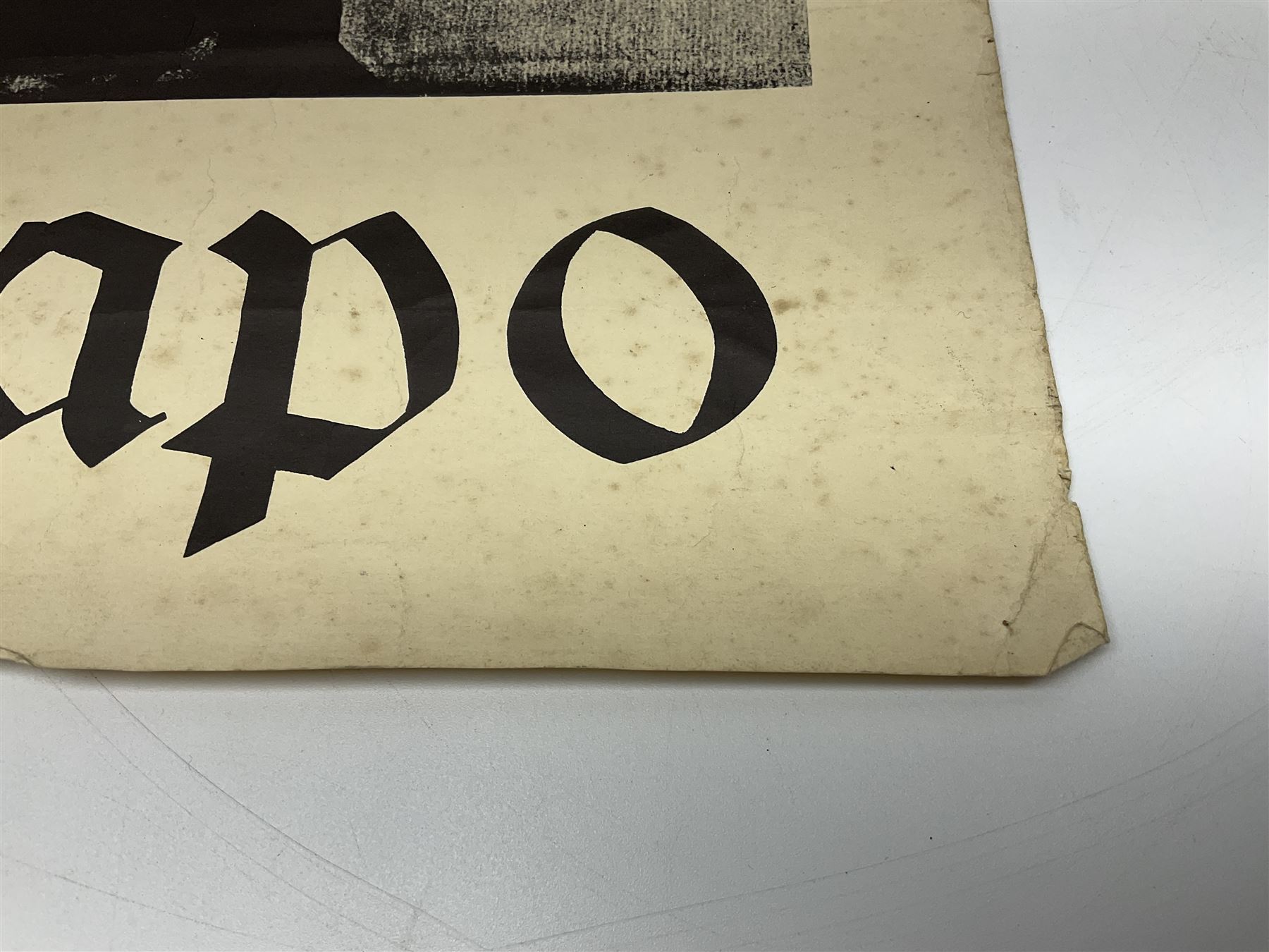 German monochrome 'Gestapo' poster, probably post-WW2, depicting the head of a grim faced Gestapo officer in uniform 55 x 42cm; unframed