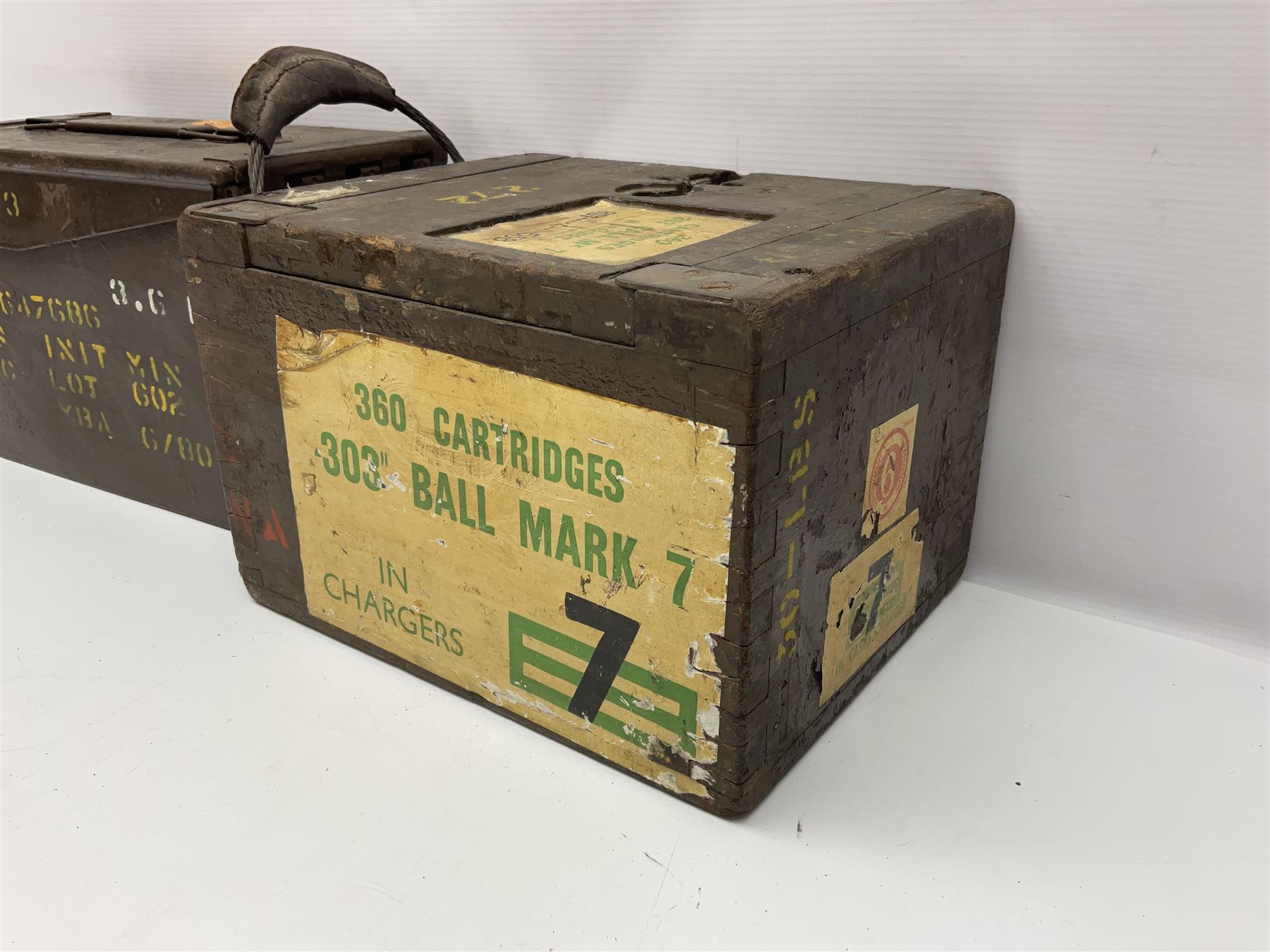 Miscellaneous shooting accessories - W.J. Bowman & Sons clay pigeon launcher; two leather cartridge belts; three cartridge bags; two canvas/leather game bags; and two metal/wooden cartridge boxes