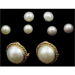 Pair of 18ct gold grey pearl stud earrings, pair of 9ct gold Mabe pearl earrings, and two other pairs of pearl earrings, all stamped or hallmarked 