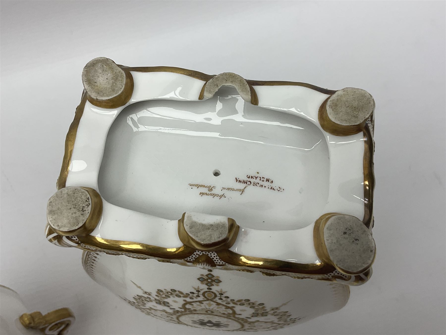 Pair of Copelands enamel jeweled twin handle vases, each decorated with a seated female figures, makers mark beneath, H22cm