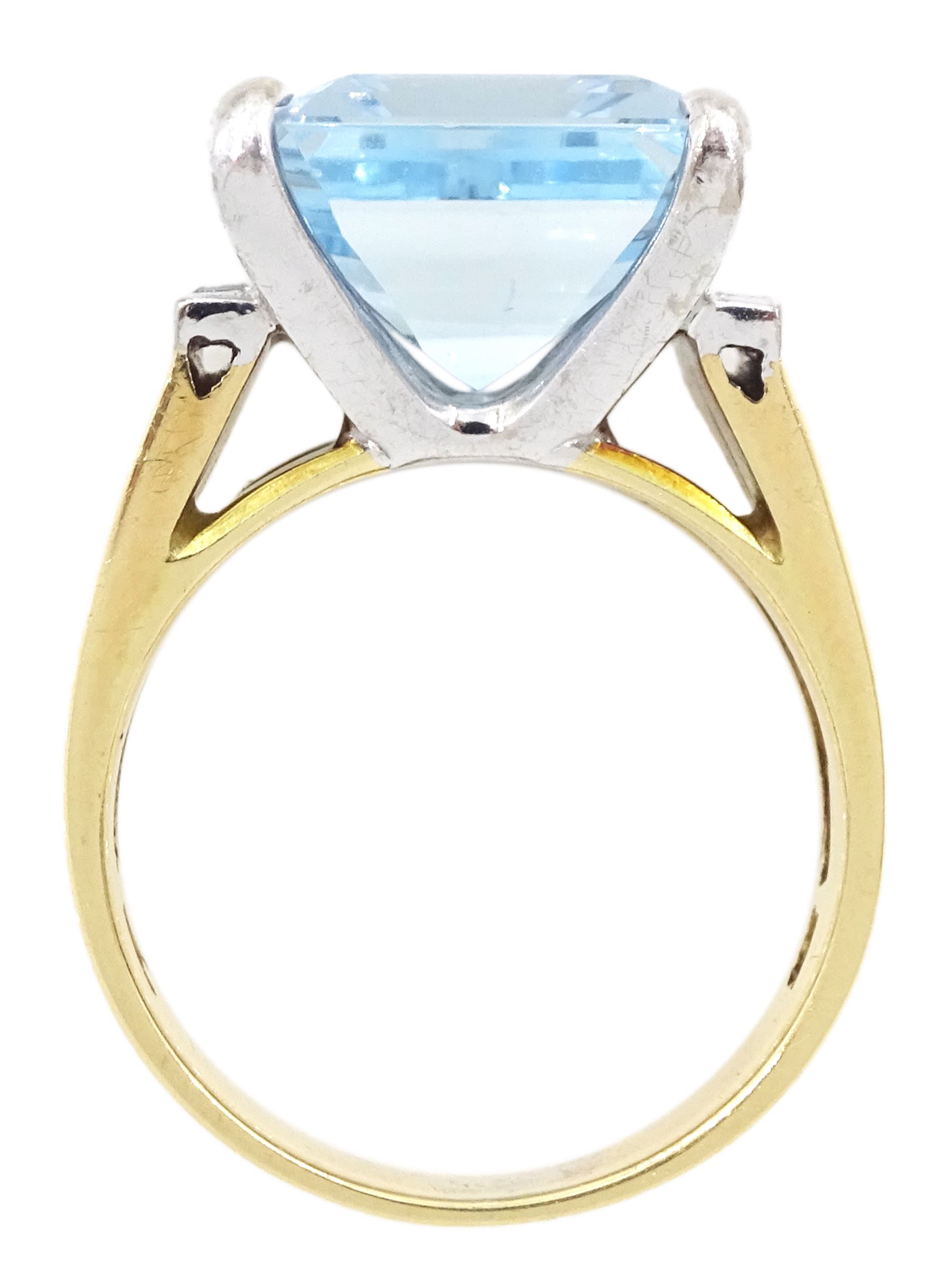 14ct gold aquamarine and diamond ring, emerald cut aquamarine with four baguette cut diamonds set either side, stamped 14K 585, aquamarine approx 6.55 carat