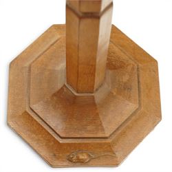 Mouseman - mid-20th century oak standard lamp, octagonal turned column, with faceted stepped base, with carved mouse signature, by the workshop of Robert Thompson of Kilburn