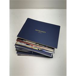 Three Moorcroft reference books, comprising Winds of Change, The Phoenix Years and A New Dawn, together with a collection of Moorcroft magazines 