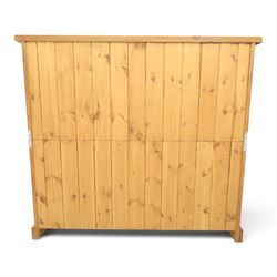 Indigo Furniture - large rustic oak combination chest, three drawers above ten drawers, with blackened pulls, raised on a plinth base