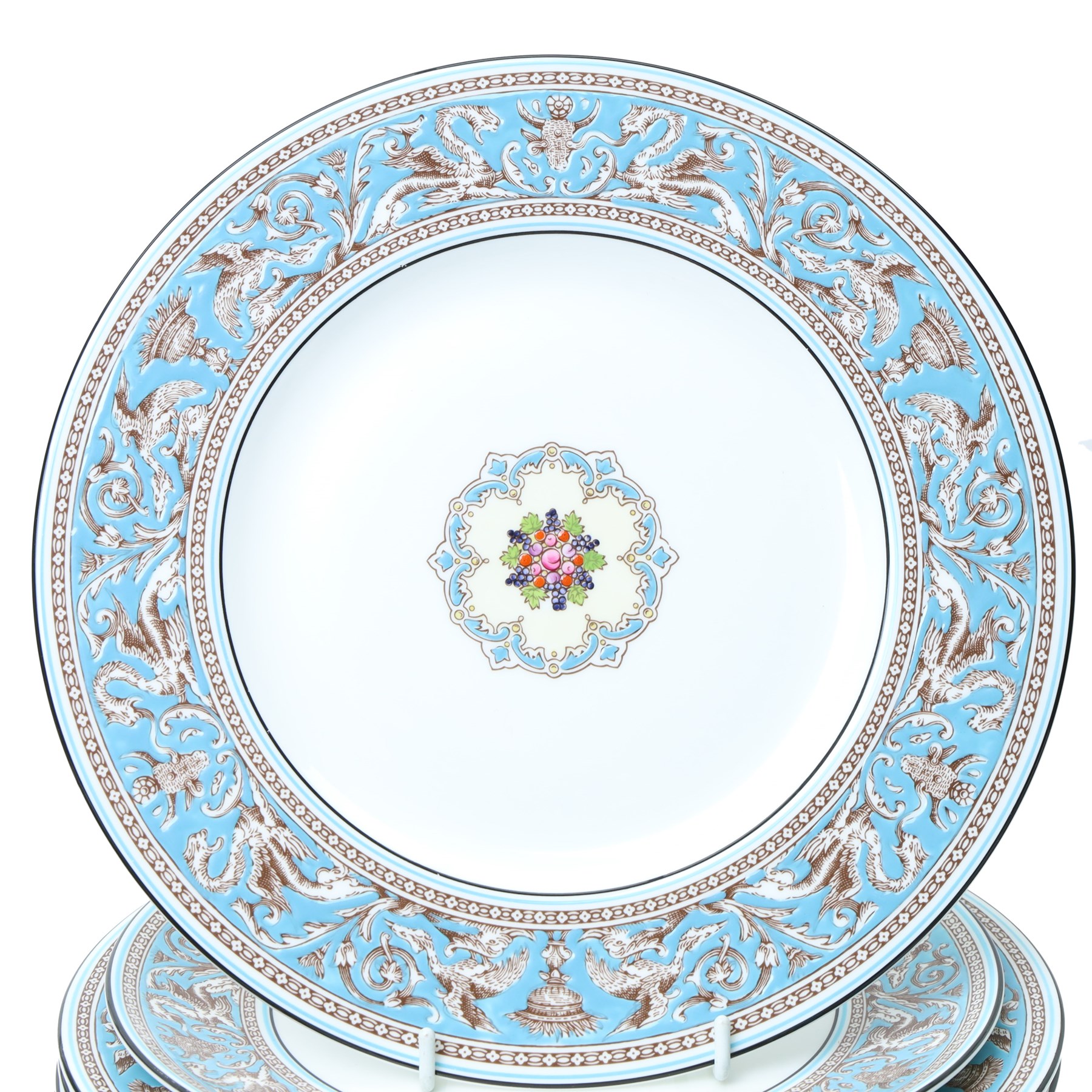 Extensive Wedgwood Turquoise Florentine part service tea, dinner and coffee service for six covers comprising six dinner plates, six dessert plates, six soup bowls and stands, pair of vegetable dishes and covers, gravy boat ad stand, oval meat plates, six tea cups and saucers, six coffee cans and saucers, six tea plates, teapot, coffee pot, sucrier and cover, sugar bowl, milk and cream jugs and cake plate, 72 pieces