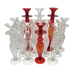 Thirteen glass candle sticks with twist knopped stem, in various sizes, tallest H51cm 