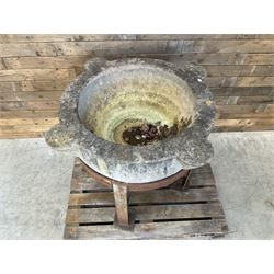 Large 19th century circular stone mortar planter on wrought iron stand