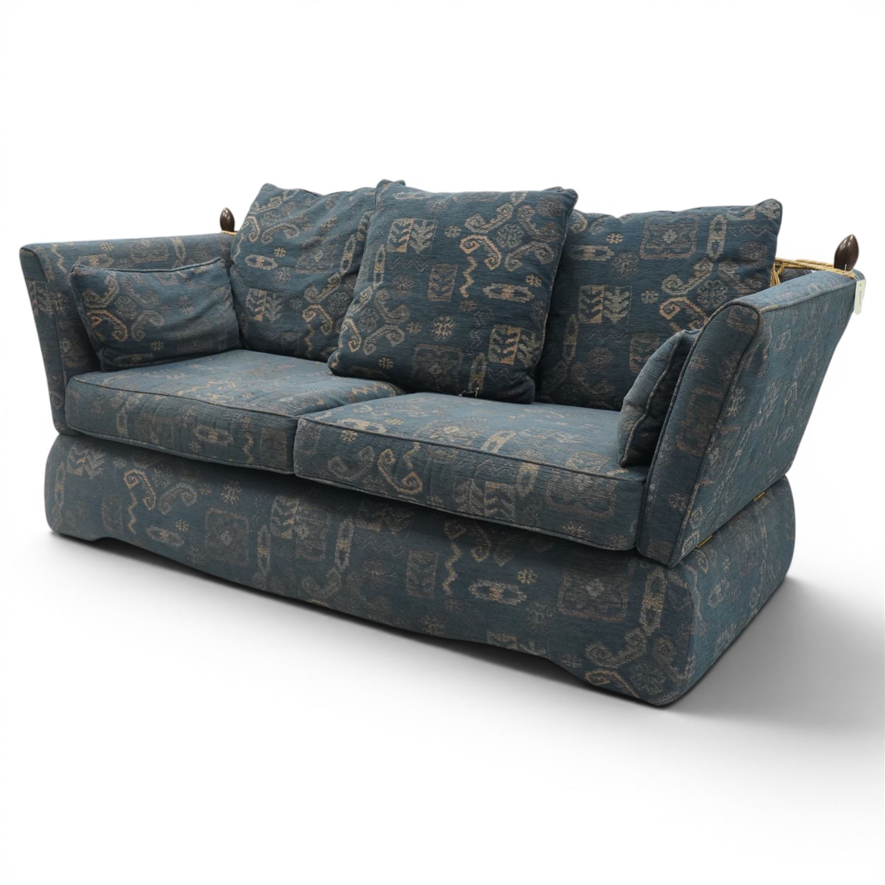 Edwardian design Knole-type drop-end two seat sofa, of traditional shape with hinged drop arms held by ropetwist tassels, upholstered in cobalt blue geometric patterned fabric, with loose seat and scatter cushions; together with matching ottoman footstool (W70cm D55cm H39cm)