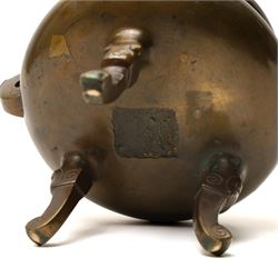 19th century Chinese bronze censer with loop handles and on shaped supports D13cm and an Asian bronze bell H17cm