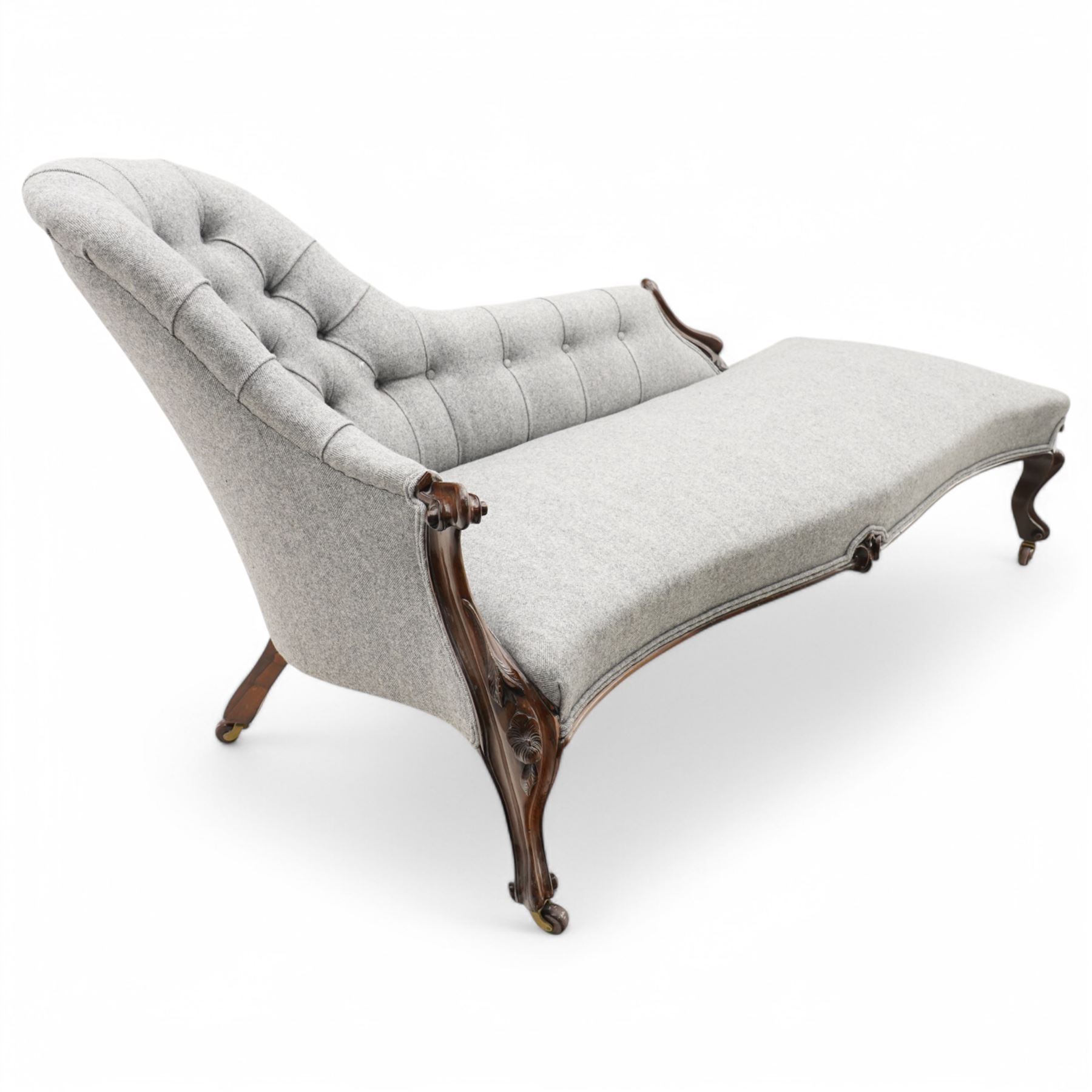 Victorian rosewood framed chaise longue, shaped back upholstered in buttoned herringbone fabric over serpentine fronted seat, scrolled cabriole arm terminals and supports terminating to ceramic castors 