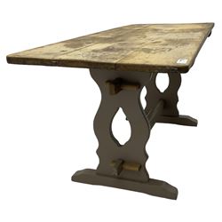 20th century oak refectory dining table, rectangular stripped top on painted base, shaped end supports on sledge feet united by two pegged stretchers