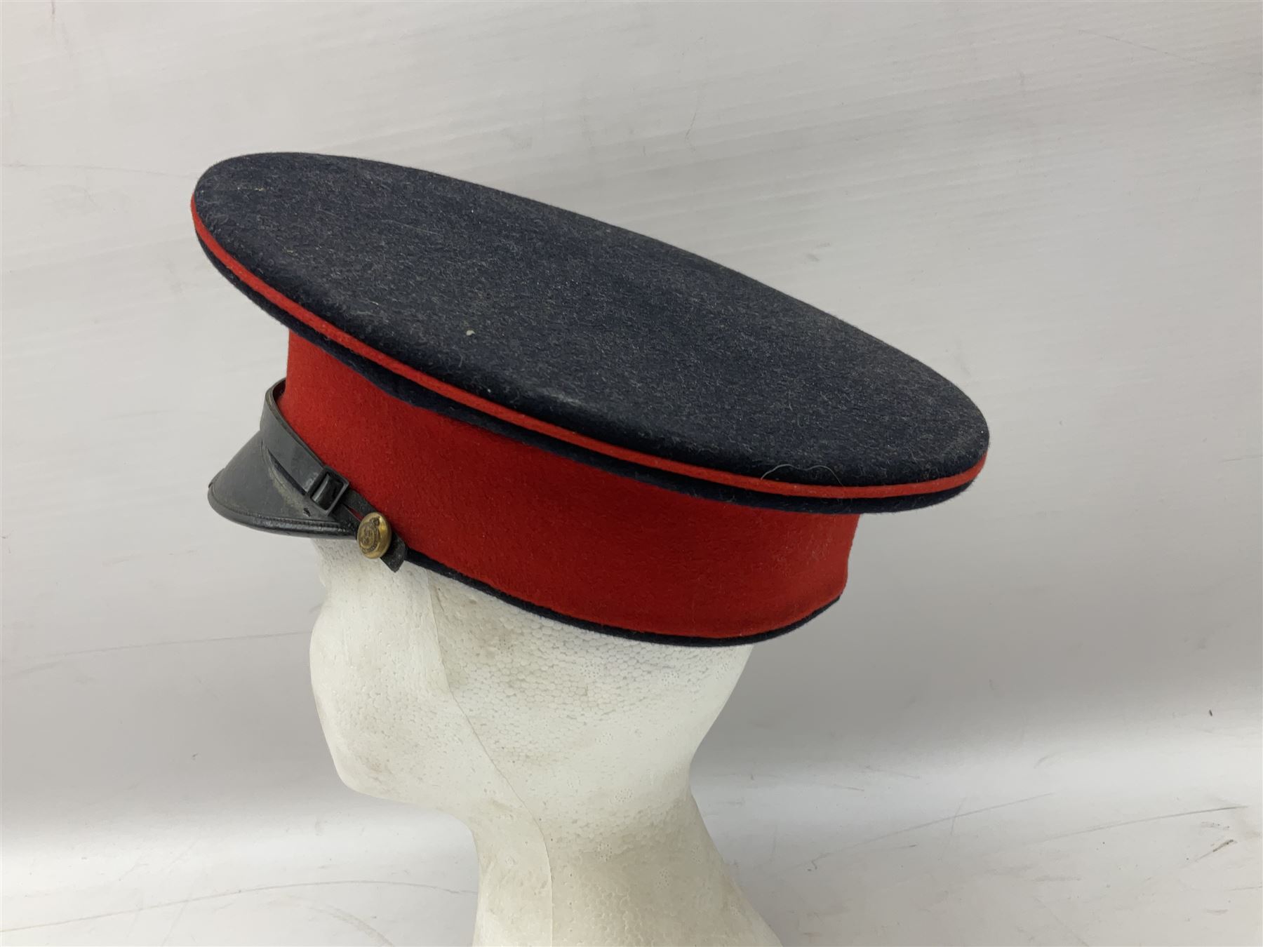 Royal Military College Sandhurst parade uniform with peaked cap and two-piece mess dress, all bearing historic manuscript labels for J.E.A. Baldwin, possibly Air Marshal Sir John Eustace Arthur Baldwin (1892-1975) who served in the British Army 1910-18 & 1944-58 and in the RAF 1918-44.