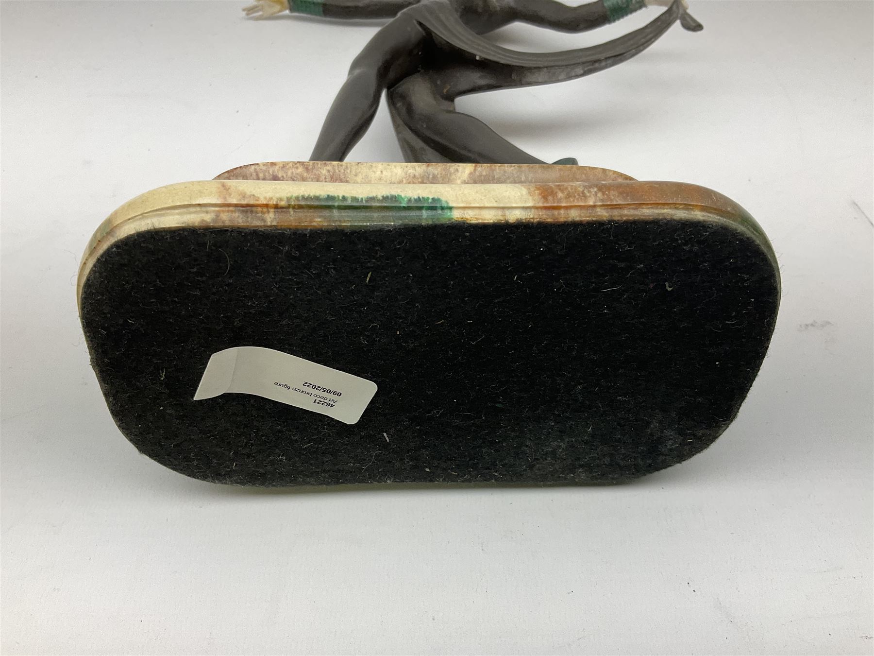 Art Deco style bronze, after Josef Lorenzl, modelled as a dancing lady with outstretched arms, with resin head and hands, raised upon marble effect base, signed to base, H38cm