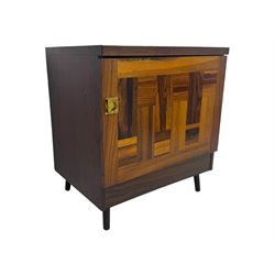 Troeds of Sweden - mid-20th century rosewood veneered cupboard, single door with brass handle enclosing interior fitted with one drawer, raised on ebonised tapered and splayed supports