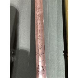 George VI Royal Army Service Corps Officer's sword, with 87cm steel blade, wirebound fishskin grip, chequered backstrap and stepped domed pommel, in brown leather scabbard, overall L102cm