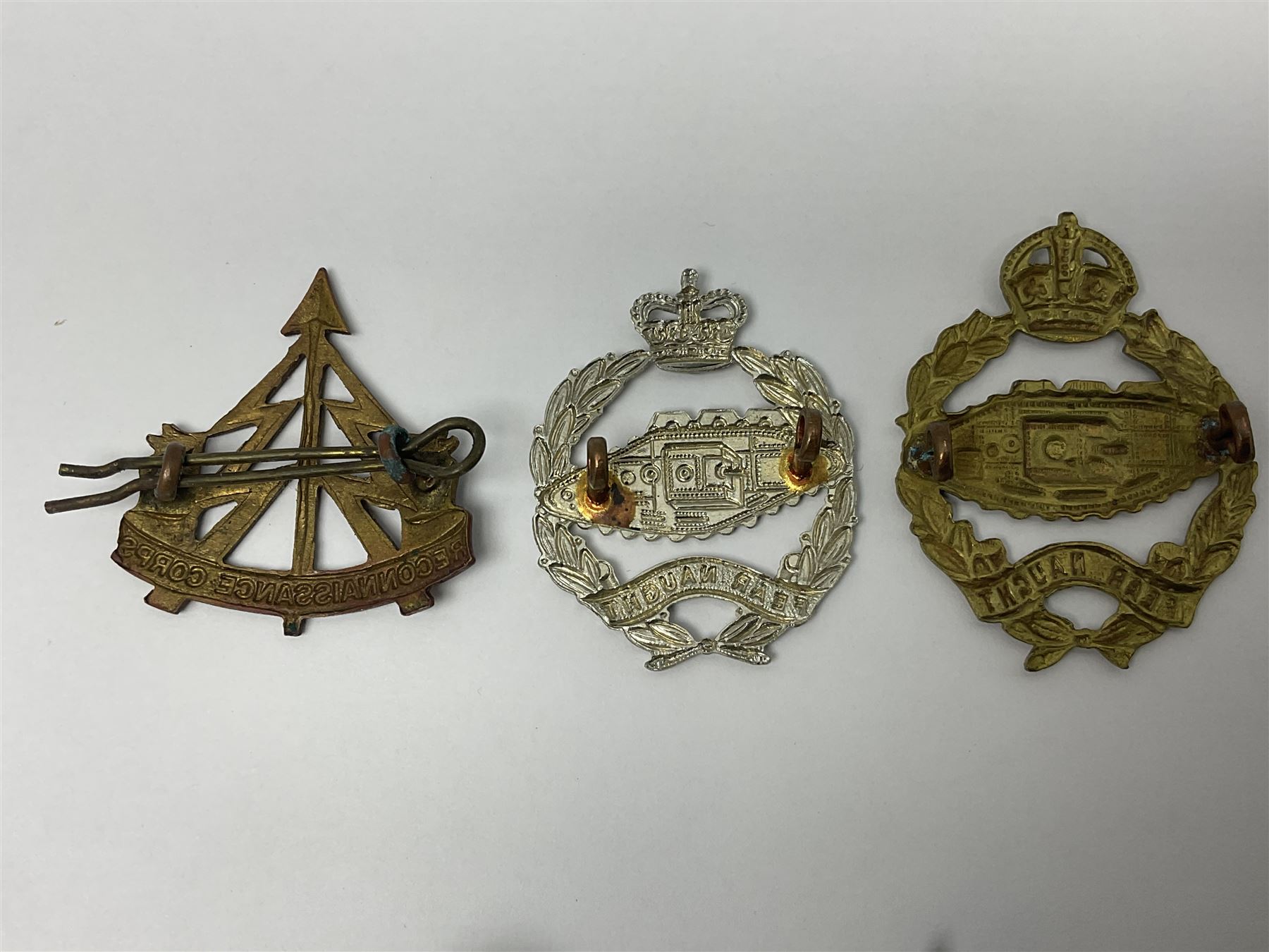 Twenty-seven military metal cap badges including Royal tank Corps, Reconnaissance Corps, Royal Armoured Corps, Royal Corps of Signals, Womens Army Auxiliary Corps, Queen Mary's Army Auxiliary Corps, Auxiliary Territorial Service,  Royal Engineers, REME, Army physical Training Corps etc 