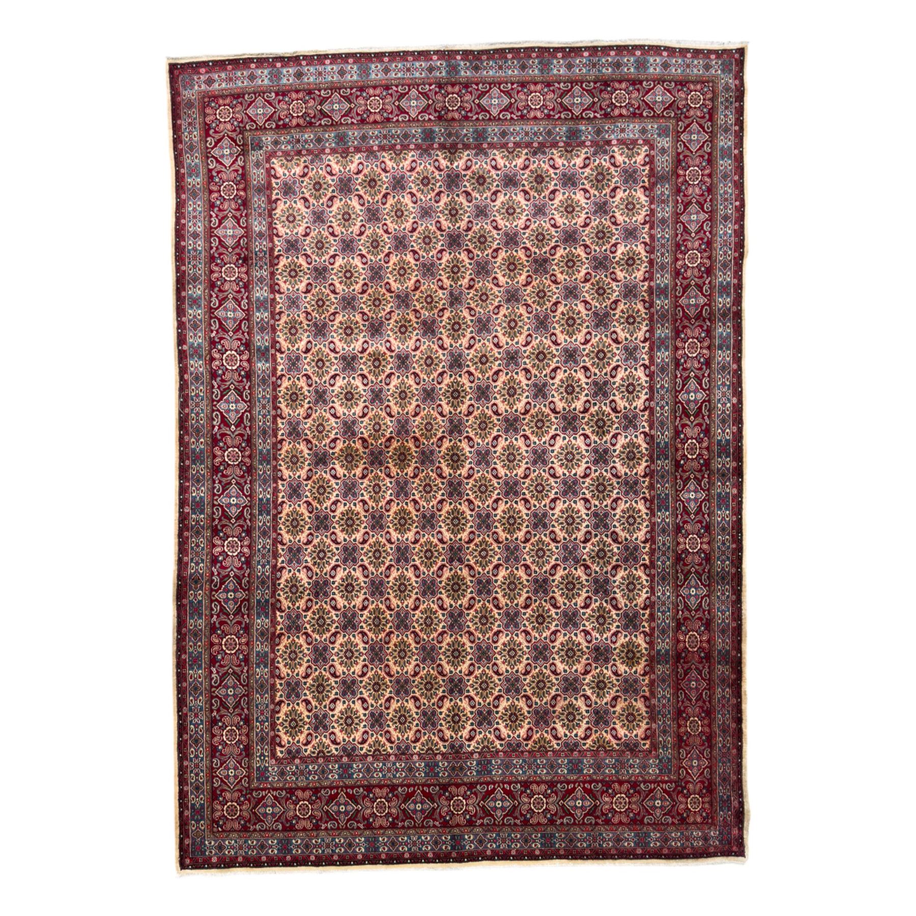Northwestern Persian Hamadan carpet, hand-knotted, ivory field with an all-over Herati design of rosettes and serrated leaves within multiple borders, madder red with angular vine and rosette motifs, 375cm x 271cm 