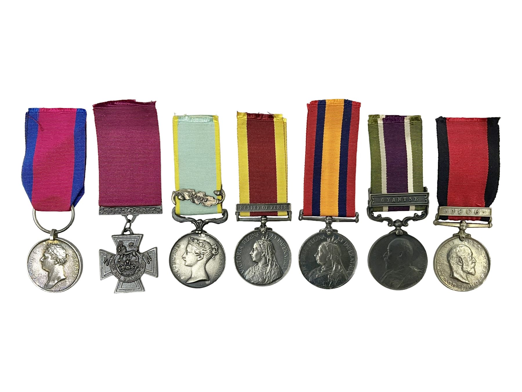 Seven copies of early medals - Waterloo, Crimea, Mediterranean, China 1900, Victoria Cross, Natal Rebellion and Tibet 1903-4; all with ribbons (7)