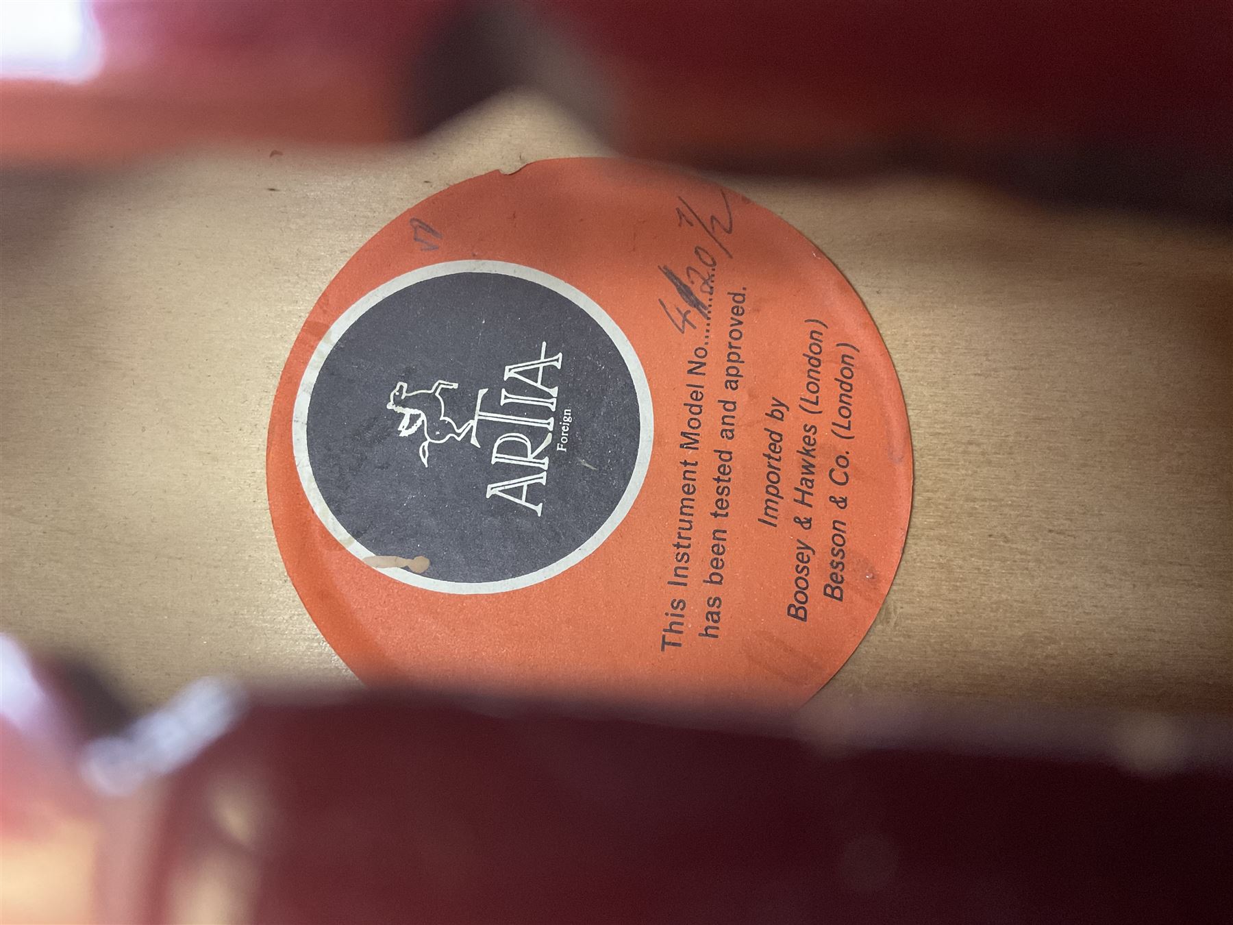 Two student half-size cellos - Boosey & Hawkes Artia with 65cm one-piece back and spruce top; bears maker's label; L104cm overall; and Romanian with 65.5cm two-piece maple back and ribs and spruce top; bears label; L108.5cm overall; each in soft carrying case with two bows (2)