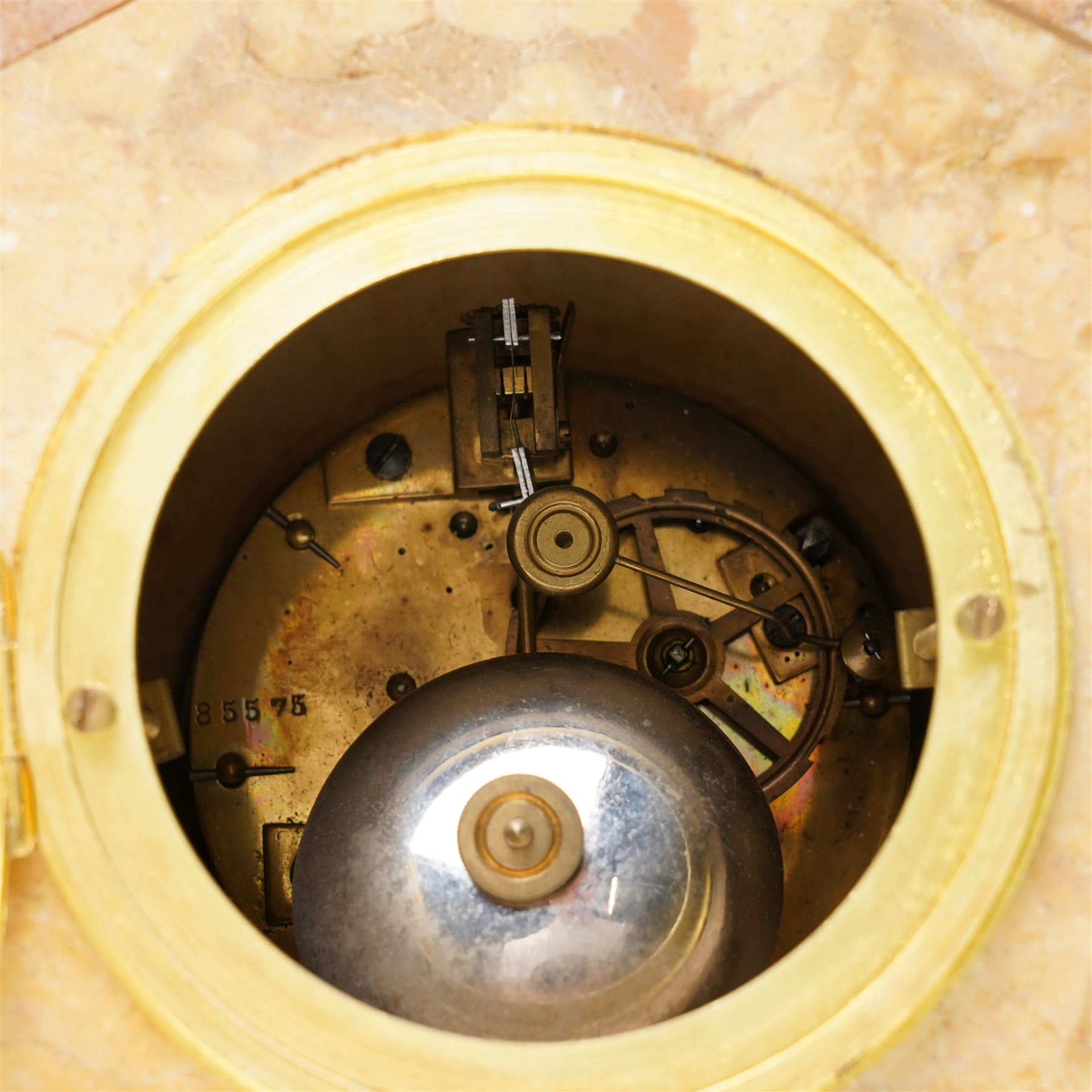 French Art Deco mantel clock, the white dial inscribed Loudeac, with bell strike in marble case surmounted by two gilt metal figures holding doves H26cm x W30cm