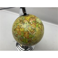 Art Deco style world globe with chrome aeroplane finial and mounts, H31cm