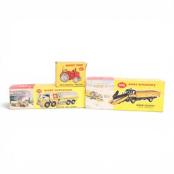 Three Dinky Toys diecast vehicles, comprising Field Marshall Tractor no. 301, Shell BP Fue...
