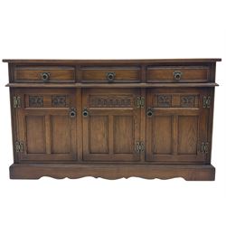 Old Charm Tudor style oak three drawer sideboard