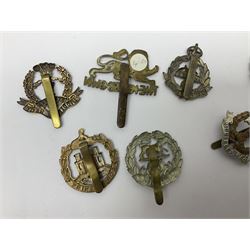 Seventeen regimental cap badges including Dorsetshire, Worcestershire, Staffordshire, Lancashire, Manchester, Middlesex, Berkshire, Bedfordshire etc (17)