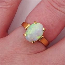 18ct gold single stone opal ring, stamped