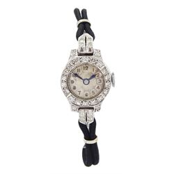  Art Deco platinum diamond set manual wind wristwatch, on black cord bracelet, with 9ct white gold clasp, cased