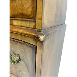 Burton Reproductions walnut chest on chest, fitted with six serpentine drawers