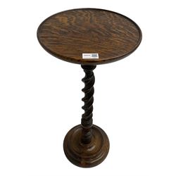Early 20th century oak barley-twist wine table, circular top on spiral turned supports, turned circular base