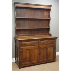  19th century oak dresser, two drawers above two panelled doors, panelled sides, raised two heights plate rack, W129cm, H187cm, D56cm  