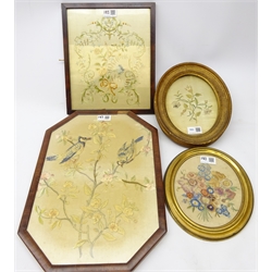  Four Georgian embroidered pictures, bouquet of flowers on silk within oval frame and two others worked with flowers, 19th century wool work picture on silk depicting birds amongst flowers in hexagonal frame (4)  