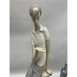 Four Lladro figures, comprising Touch of Class no 5377, Boy Student no 4517, Ocean Beauty no 5785 and Carnival Couple no 4882, largest example H45cm