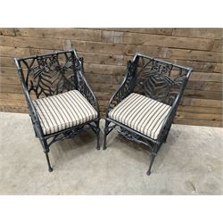 Richard Bawden (1936-2024): Pair of Cat design painted cast iron garden armchairs