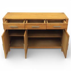 Solid light oak sideboard, fitted with three drawers and three cupboards