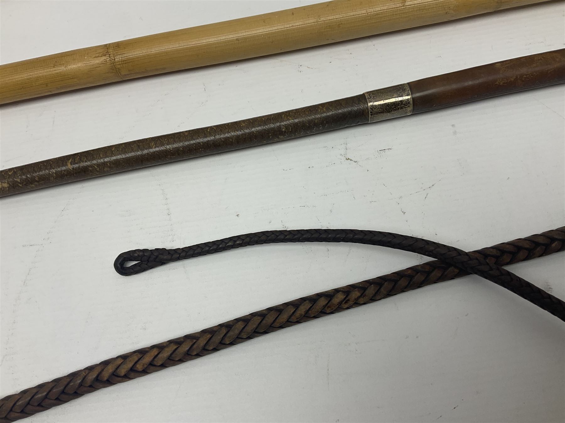 Late Victorian leather hunting whip, with antler handle and presentation engraving to hallmarked silver collars, together with a horse measuring walking stick, whip L205cm