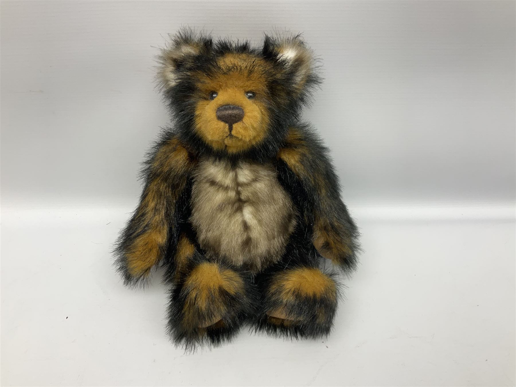 Seven Charlie Bears, comprising limited edition Anniversary Cheesecake SJ5471, designed by Isabelle lee, 431/500, Nuala CB185169, Liddy CB161648A, Philomena CB151592, and AJ CB171784B, each designed by Isabelle Lee, plus Shenanigans CB205243O, and another example lacking tag 