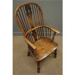  19th century elm and yew wood double bow Windsor armchair, crinoline stretcher  