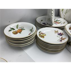Royal Worcester Evesham pattern tea and dinner wares, to include, three covered tureens of various sizes, coffee pot, two lidded pots, tea cups and saucers of various sizes, two egg cups, round serving platter, five dinner plates, large jug, pair of napkin rings, salt and pepper etc (72)