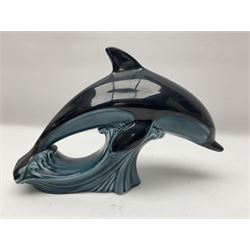 Poole pottery Dolphin, together with Royal Worcester miniature teacup and saucer, Royal Crown Derby miniature teacup and saucer in Derby Posies and one other