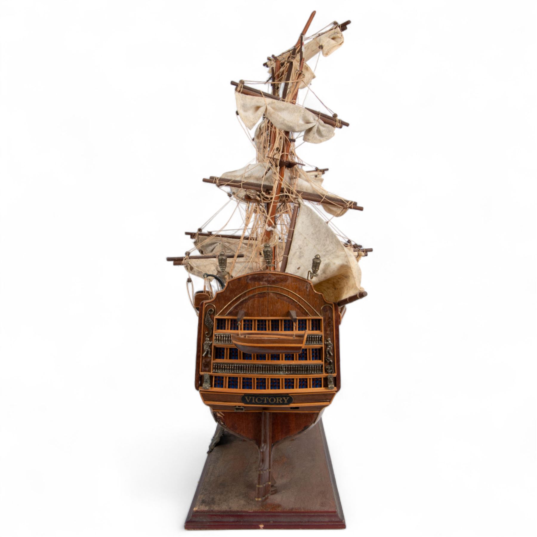 Wooden scale model of HMS Victory, upon a wooden stand with name plaque, H72cm L92cm