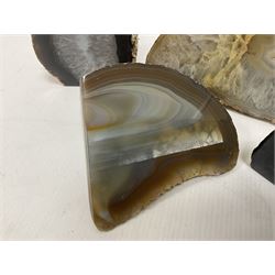 Four polished blue agate geodes, largest H10cm, L18cm