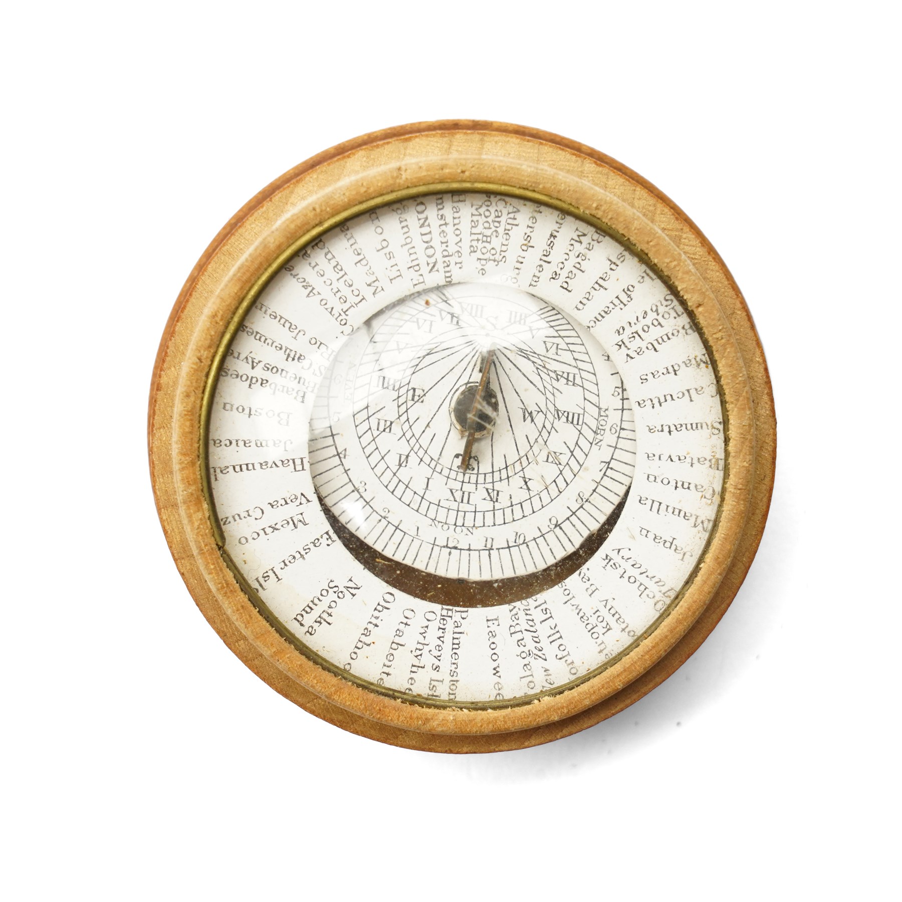 19th century pantochronometer, with central compass under domed glazed cover, within a turned lidded sycamore case, with patent pantochronometer label beneath