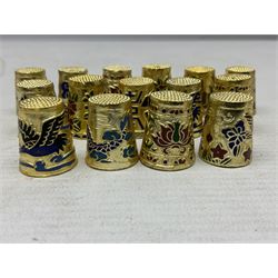 Twenty cloisonné thimbles, decorated with, flowers, birds, dragons, butterflies, and other animals